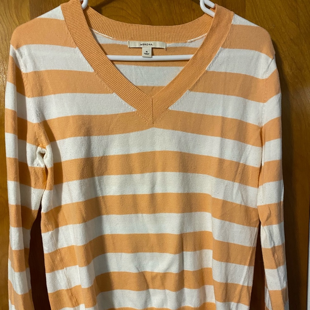 Peach and white sweater